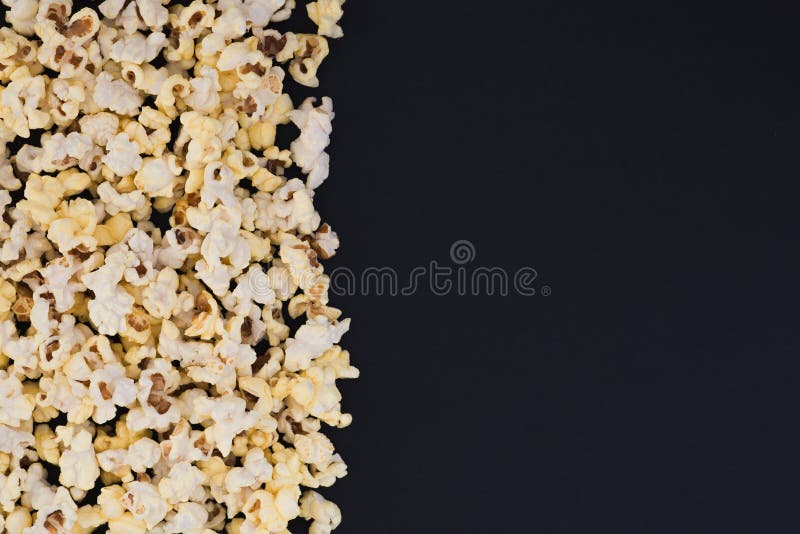 White 3d glasses,metal can with a drink, popcorn on a black background, top view, copyspace. Cinema Concept. White 3d glasses,metal can with a drink, popcorn on a black background, top view, copyspace. Cinema Concept